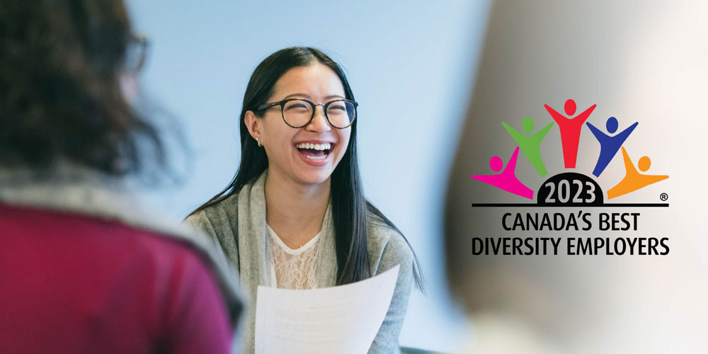2023 Canada's Best Diversity Employer logo over an image of a woman smiling.